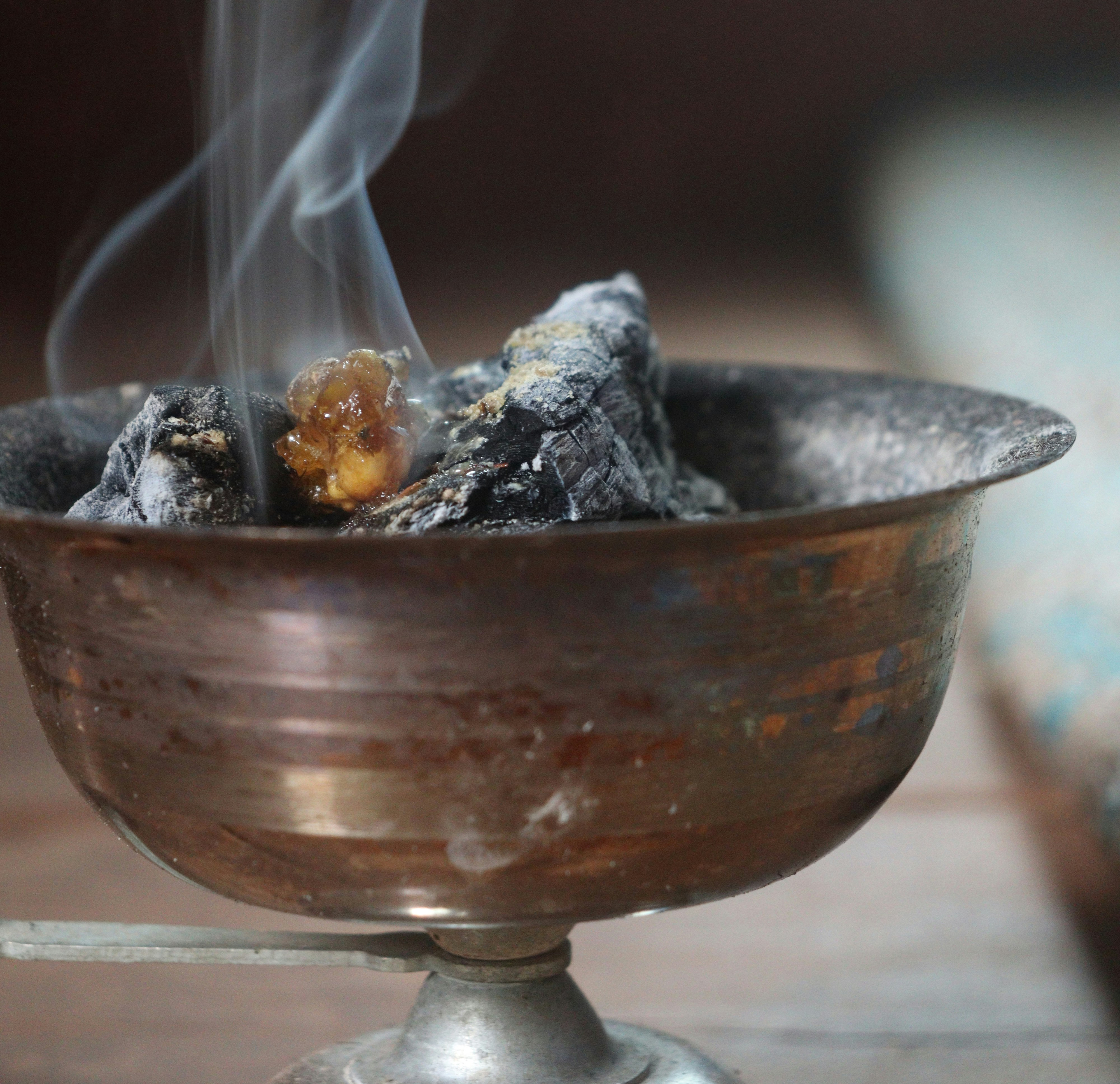 Copal incense burning on a Day of the Dead ofrenda